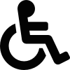 Black icon of a person in a wheelchair, commonly used to indicate accessibility for individuals with disabilities.