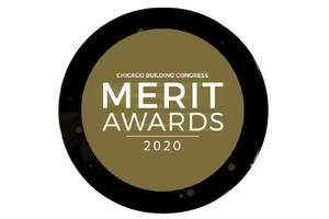 A round gold and black badge displaying "Chicago Building Congress Merit Awards 2020.