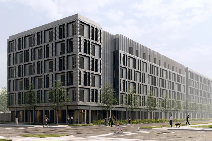 Modern multi-story building with a grid-like facade, large windows, and street-level greenery. Several people and a dog walk near the structure on a partly cloudy day.