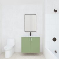 Minimalist bathroom with white toilet, green vanity with white countertop, rectangular mirror, and white tiled bathtub with dark fixtures.