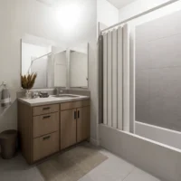 Modern bathroom with a wooden vanity, dual mirrors, countertop decor, towel ring, wastebasket, and a bathtub with a closed white shower curtain.