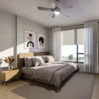 Modern bedroom with a double bed, neutral bedding, two abstract artworks above the headboard, a wooden nightstand, large window with curtains, and ceiling fan.